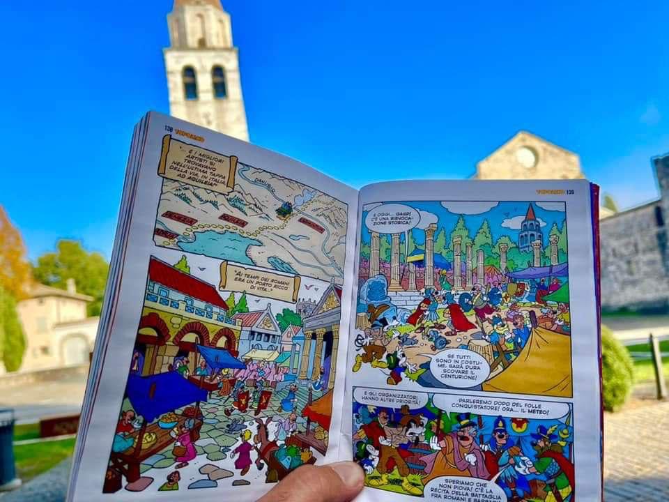 Immagine per Topolino arriva ad Aquileia, l'antica città romana protagonista nei fumetti